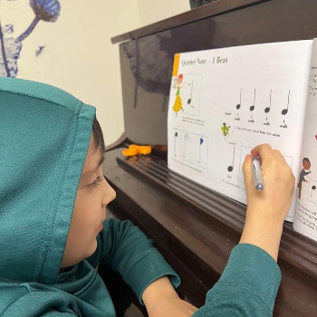 Image of a student learning music theory