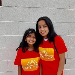 Image of two friends at Downingtown Music Academy's summer music camp